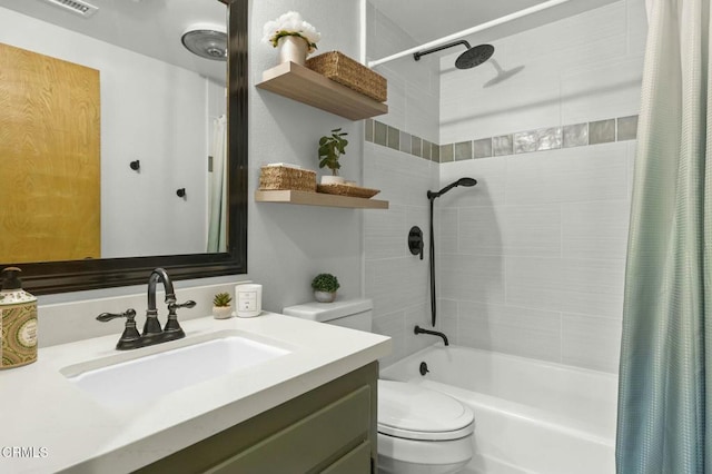 full bathroom featuring toilet, vanity, and shower / bathtub combination with curtain