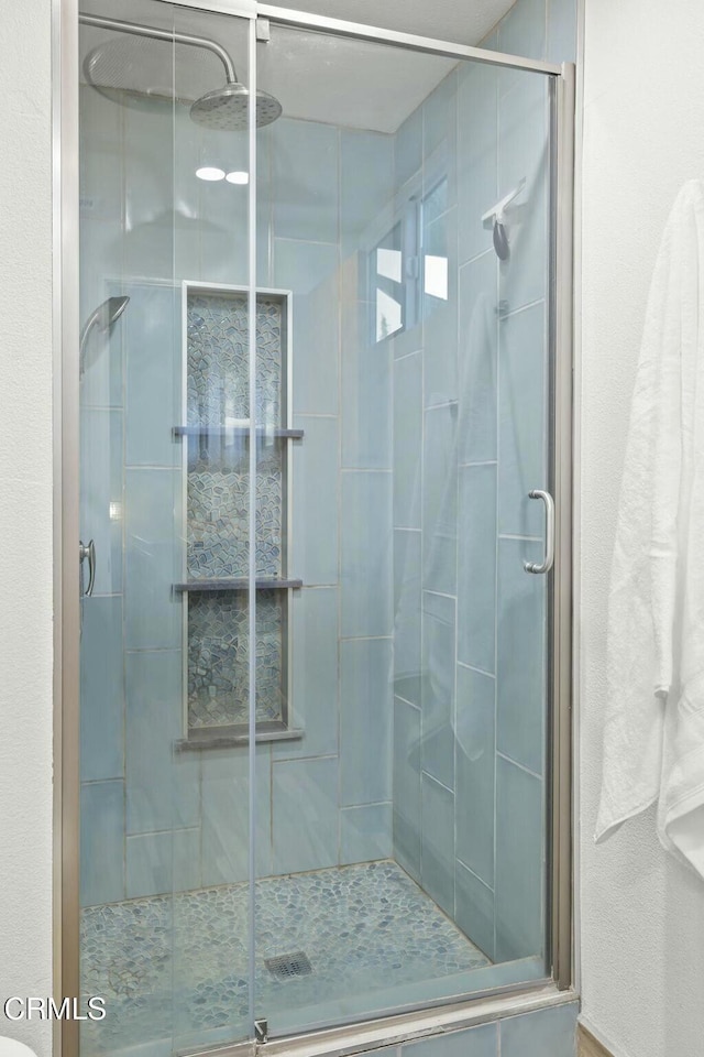 bathroom with walk in shower