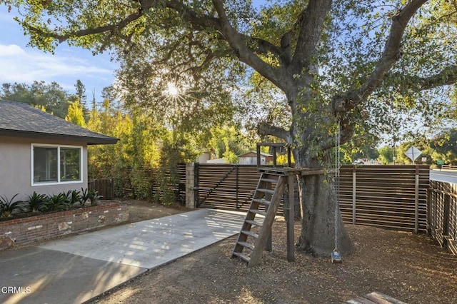 view of yard with a gate and fence