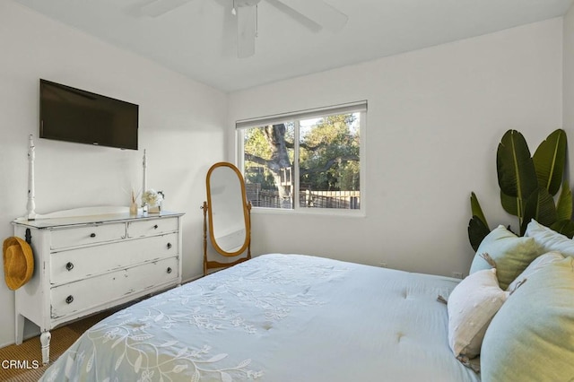 bedroom featuring ceiling fan and wood finished floors