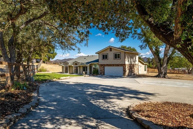 view of front of home featuring a garage