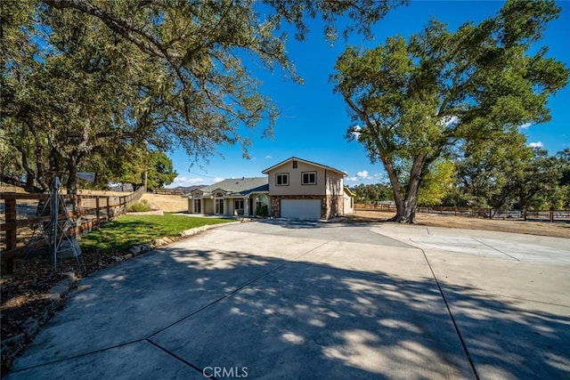 view of front of property featuring a garage