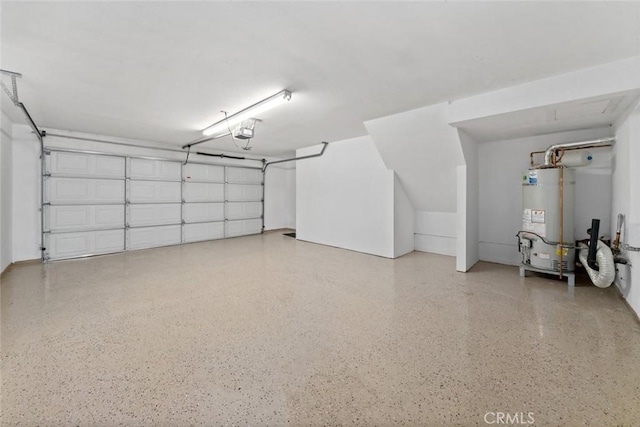 garage featuring water heater and a garage door opener