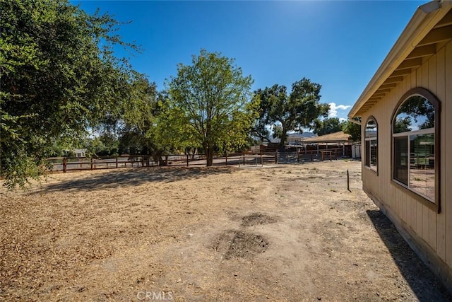 view of yard featuring a rural view