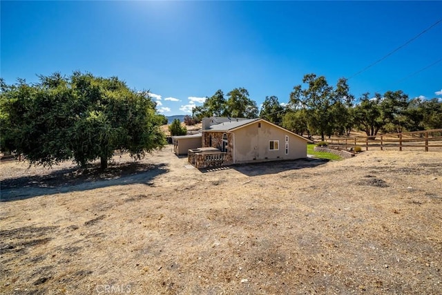 exterior space featuring a rural view