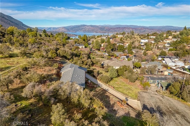 birds eye view of property featuring a mountain view