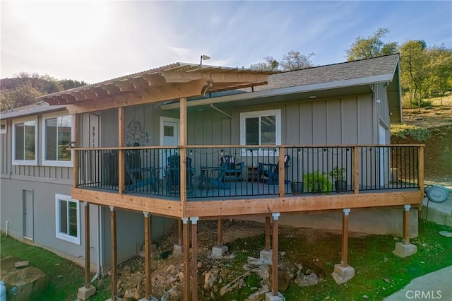 view of side of property featuring a deck