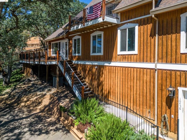 exterior space featuring a wooden deck