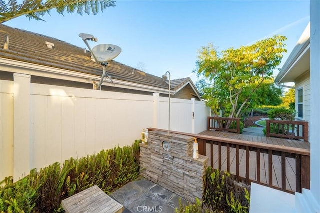 view of patio with a wooden deck