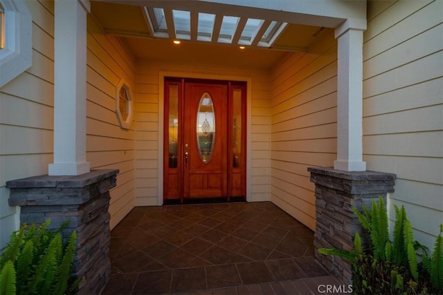 entrance to property with covered porch