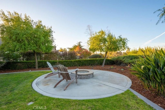 view of patio featuring an outdoor fire pit