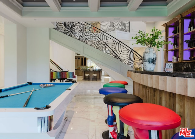 game room featuring ornamental molding, beam ceiling, and pool table