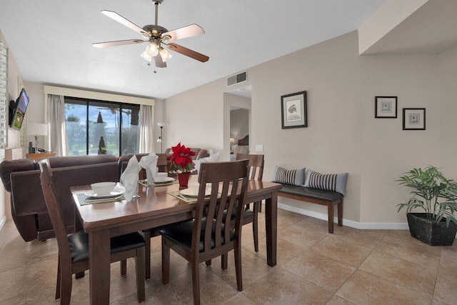 dining room featuring ceiling fan