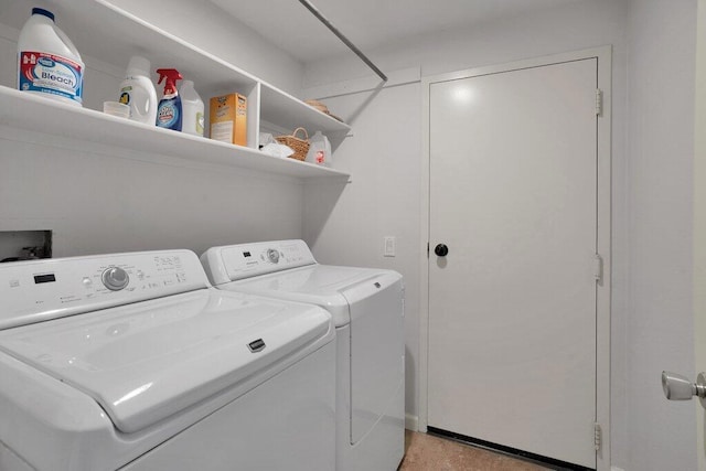 washroom featuring independent washer and dryer