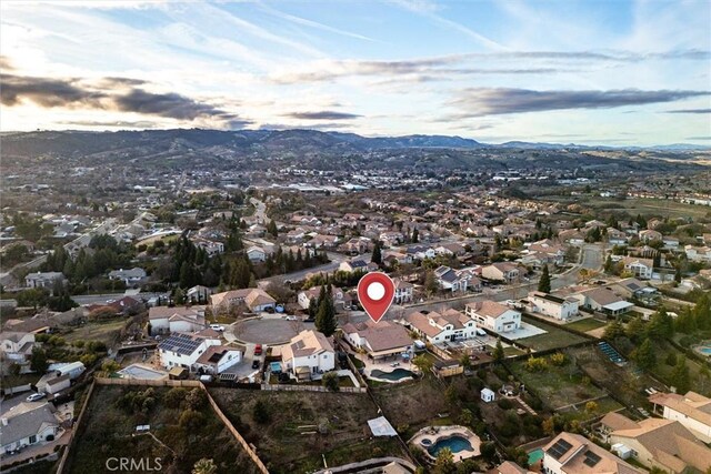 aerial view at dusk with a mountain view