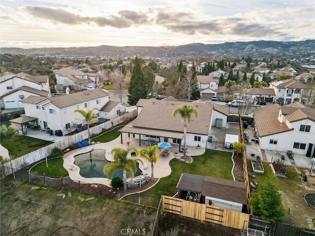 aerial view at dusk with a mountain view