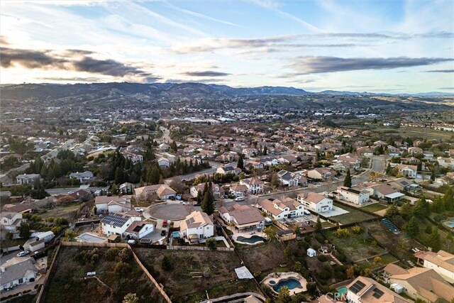 aerial view at dusk with a mountain view