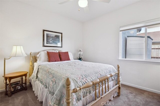 bedroom featuring ceiling fan and carpet flooring