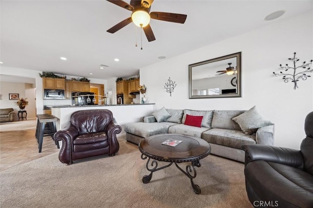 living room featuring ceiling fan