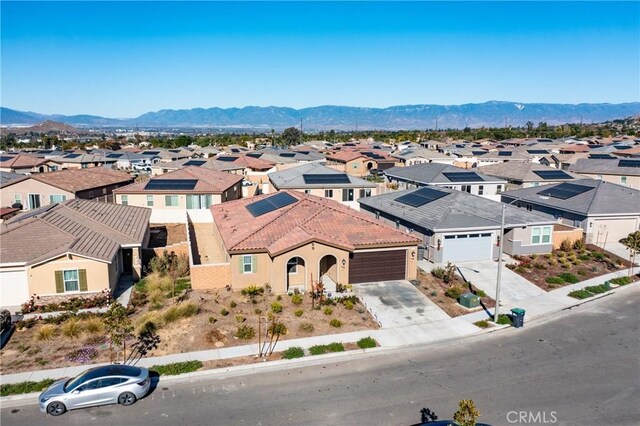 bird's eye view with a mountain view