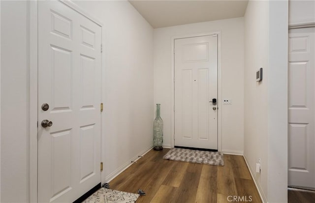 doorway featuring dark hardwood / wood-style flooring