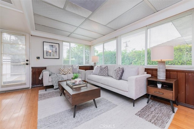 sunroom / solarium with plenty of natural light and a drop ceiling