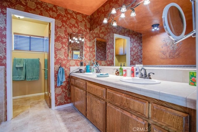 bathroom featuring tile patterned floors and vanity