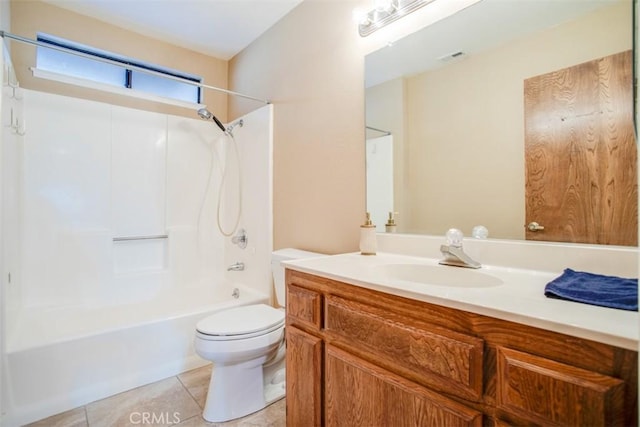 full bathroom featuring tub / shower combination, tile patterned floors, vanity, and toilet