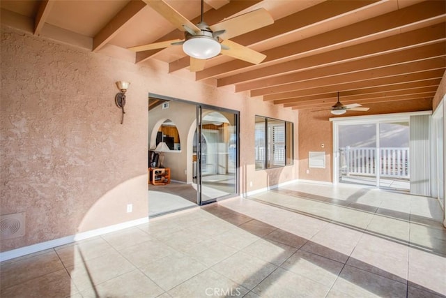 view of patio with ceiling fan