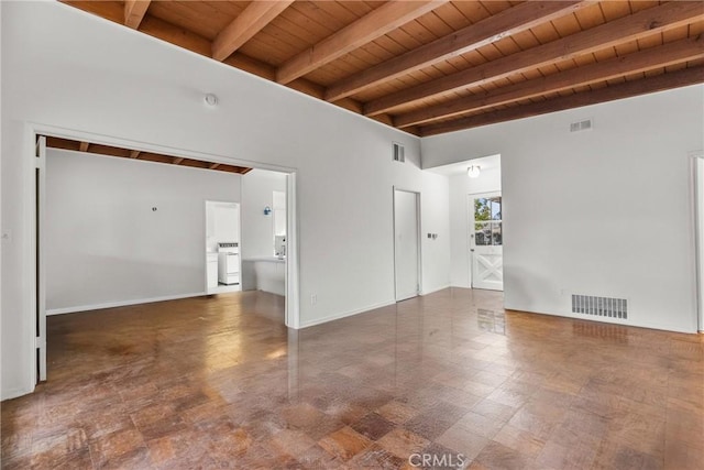 unfurnished room with beam ceiling and wooden ceiling