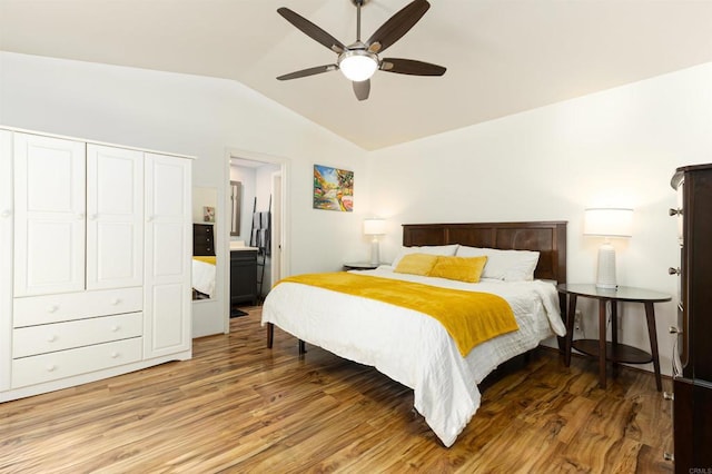 bedroom with lofted ceiling, wood-type flooring, and ceiling fan