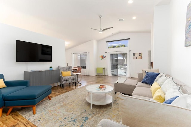 living room with ceiling fan, high vaulted ceiling, recessed lighting, wood finished floors, and visible vents