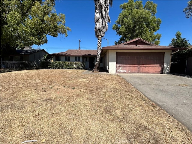 ranch-style home with a garage