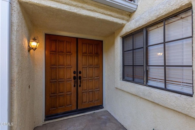 doorway to property with french doors