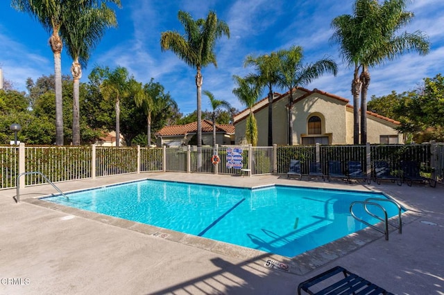 view of pool featuring a patio