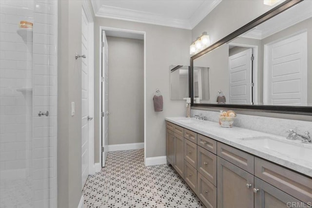 bathroom featuring crown molding and vanity