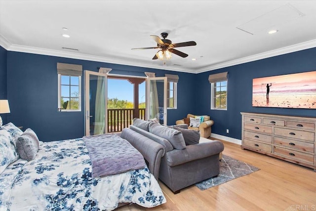 bedroom with ceiling fan, light hardwood / wood-style floors, multiple windows, and access to outside