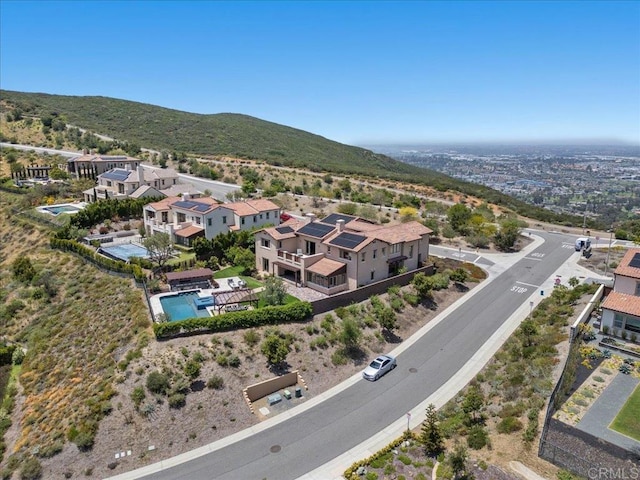 bird's eye view with a mountain view