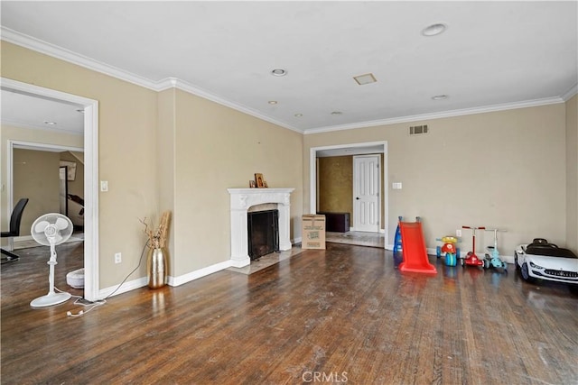 living room featuring dark hardwood / wood-style floors and ornamental molding