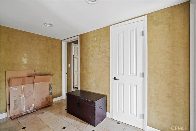 bathroom with tile patterned flooring