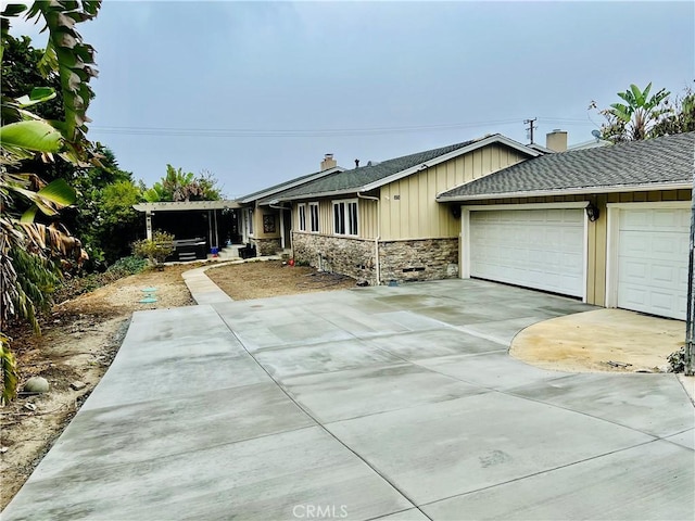 ranch-style home with a garage