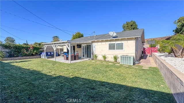 rear view of property with central AC unit, a patio, a lawn, and a pergola