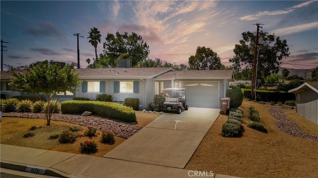 ranch-style home with a garage