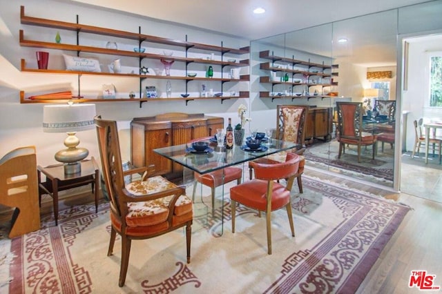 dining space featuring light hardwood / wood-style flooring