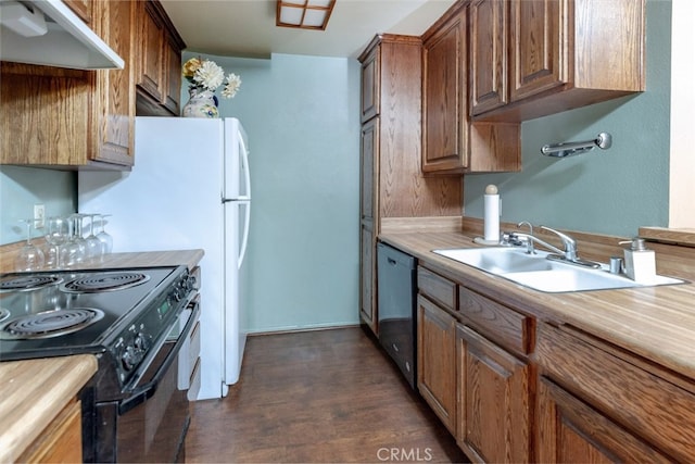 kitchen with dark wood-type flooring, sink, extractor fan, and black appliances