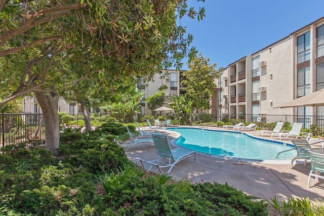 view of swimming pool featuring a patio