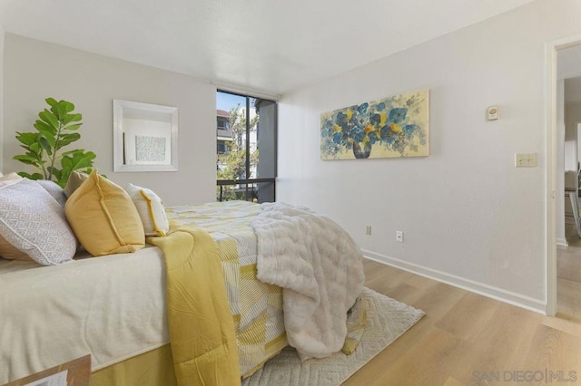 bedroom featuring hardwood / wood-style flooring