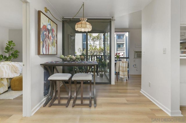 dining space featuring light hardwood / wood-style flooring