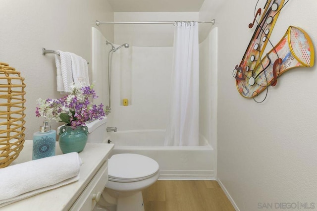 bathroom with toilet, shower / bathtub combination with curtain, and wood-type flooring