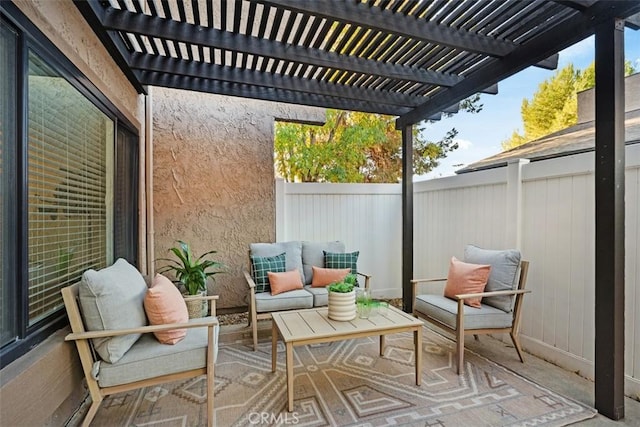 view of patio / terrace featuring an outdoor living space and a pergola